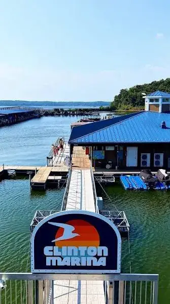 The Clinton Marina sign and boat docks on Clinton Lake near Lawrence, KS